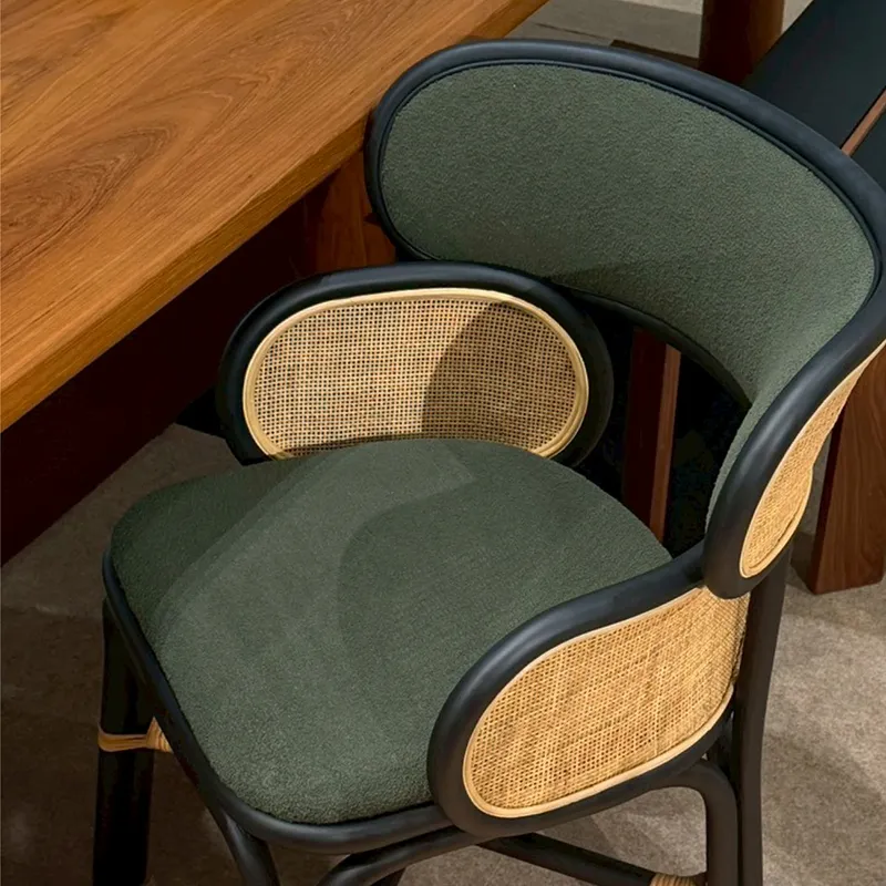 Handcrafted rattan chair by Corner 43 Decor displayed at design exhibition