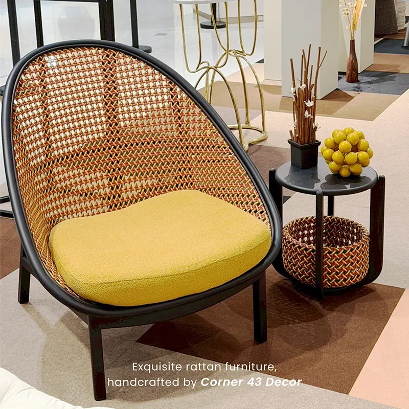 Handcrafted rattan chair by Corner 43 Decor displayed at design exhibition